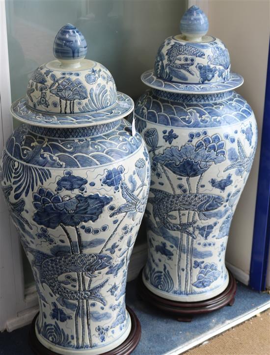 A pair of Chinese 20th century blue and white large floor vases and covers, H approx 118cm